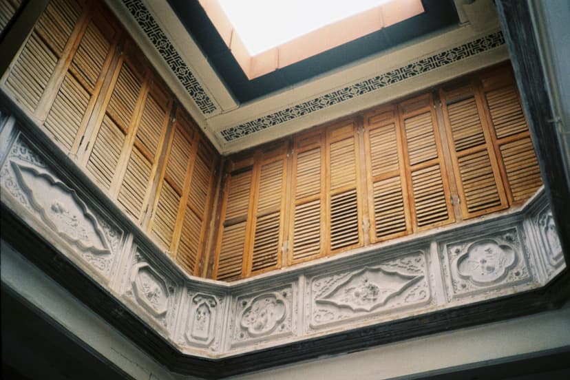 Tacoma real estate agent reviewing professional property photos on a laptop